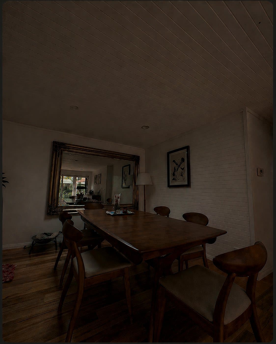 Heritage dining room before skylight install. Dim ceiling, low daylight.